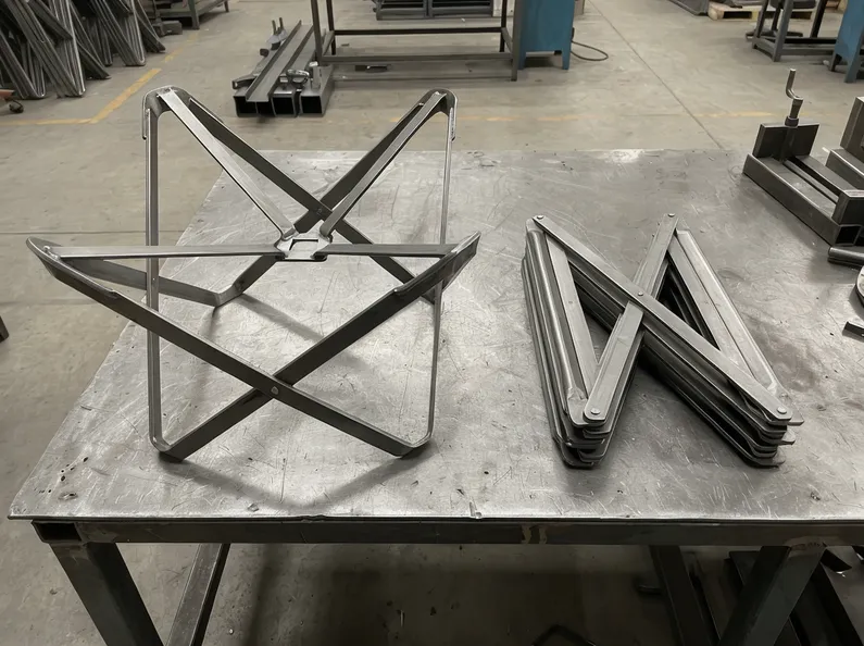 Butterfly chair mechanism wing geometry open and folded positions