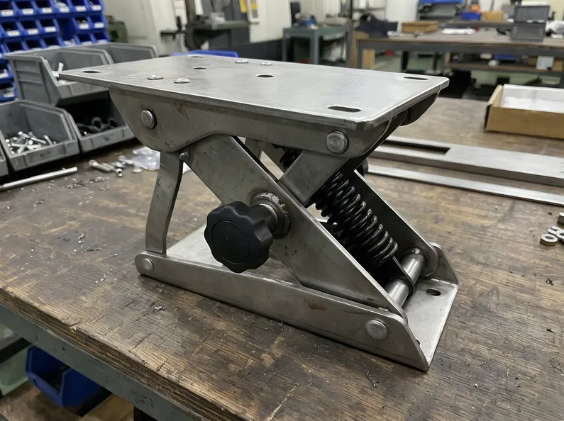 Knee tilt chair mechanism — cold-rolled steel, forward pivot geometry