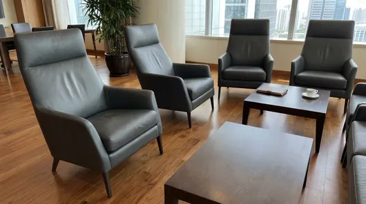 Premium hospitality and executive lounge seating with knee tilt mechanisms