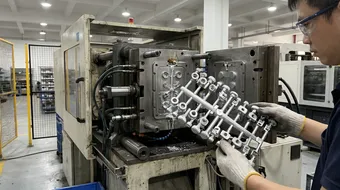 In-house zinc alloy die-casting for pivot collars, adjustment knobs, and locking detents