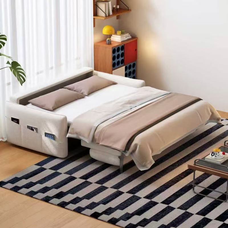 Sofa bed mechanism deployed showing full mattress platform on deep-seat sofa