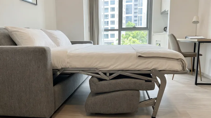 Sofa bed mechanism in boutique hotel serviced apartment unit