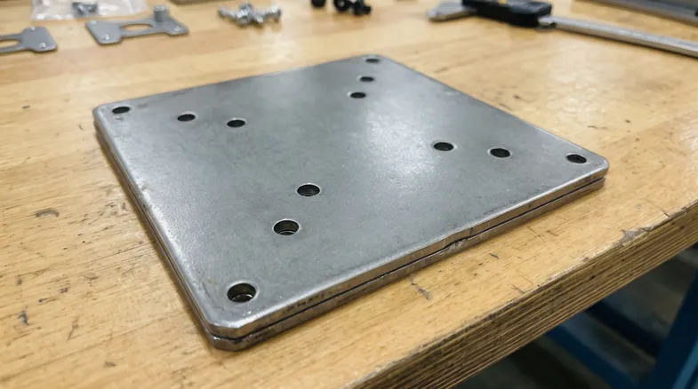 3.0mm cold-rolled steel monitor arm mounting plate with VESA bolt pattern